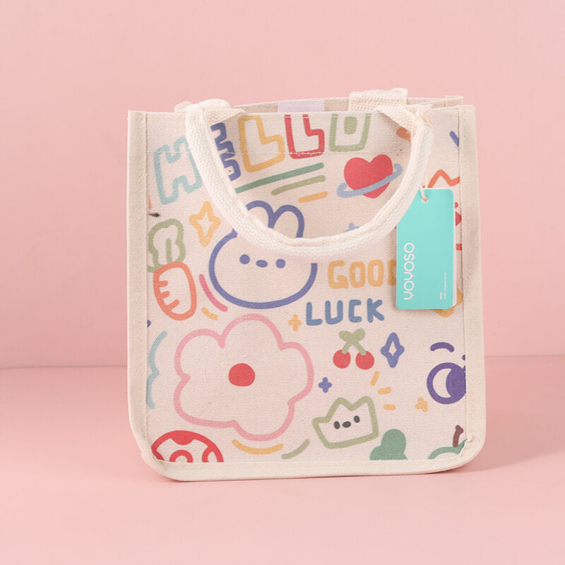 Trapezoid handbag with large green stripes