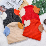 Cappello lavorato a maglia binaurale in colore a contrasto