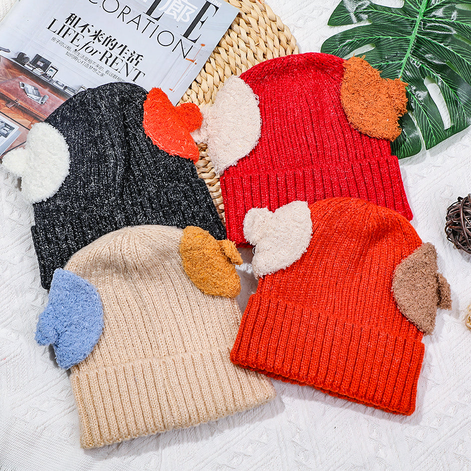 Cappello lavorato a maglia binaurale in colore a contrasto