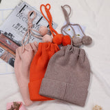 Cappello portapillole tinta unita con parte superiore vuota