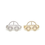 Piccola macchina tempestata di spilla dismond