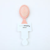 Mini pettine a cuscino d'aria