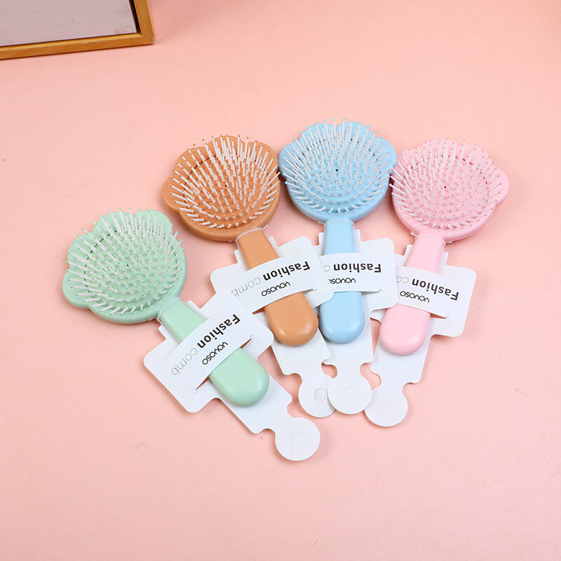 Pettine a cuscino d'aria a forma di zampa d'orso