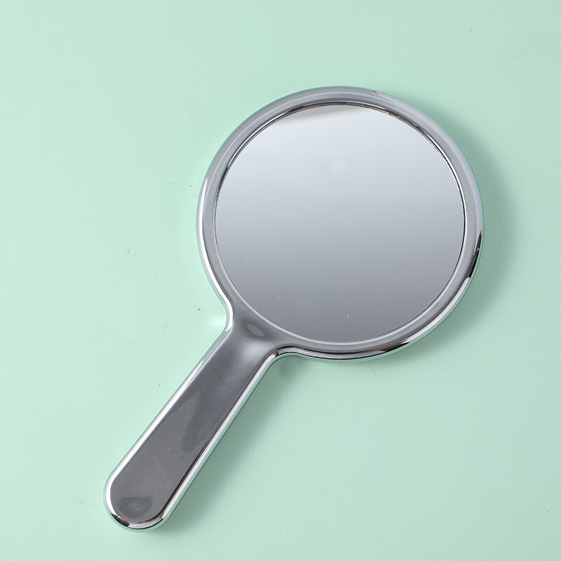 Specchio di bellezza rotondo ondulato con maniglia