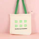 Borsa a tracolla con trifoglio verde