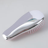 Pettine airbag per il massaggio galvanico carino e paffuto