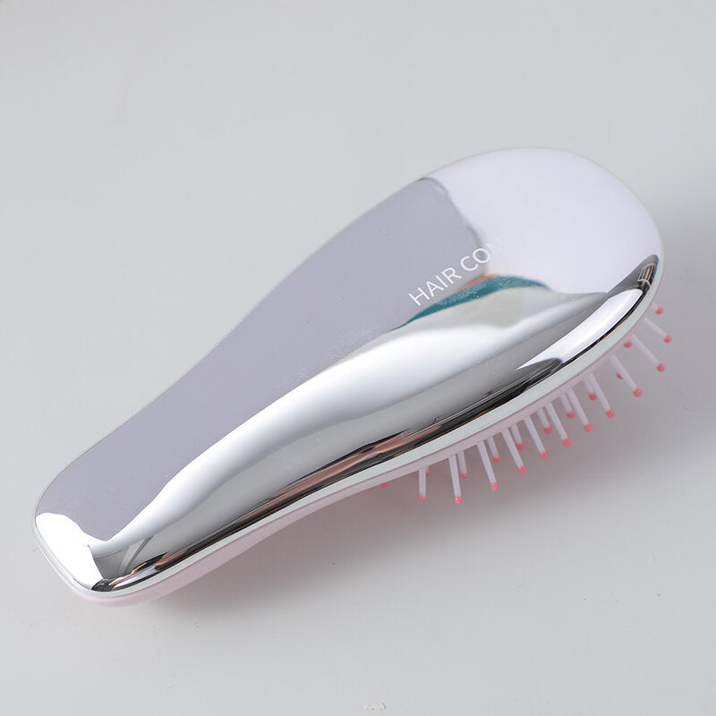 Pettine airbag per il massaggio galvanico carino e paffuto