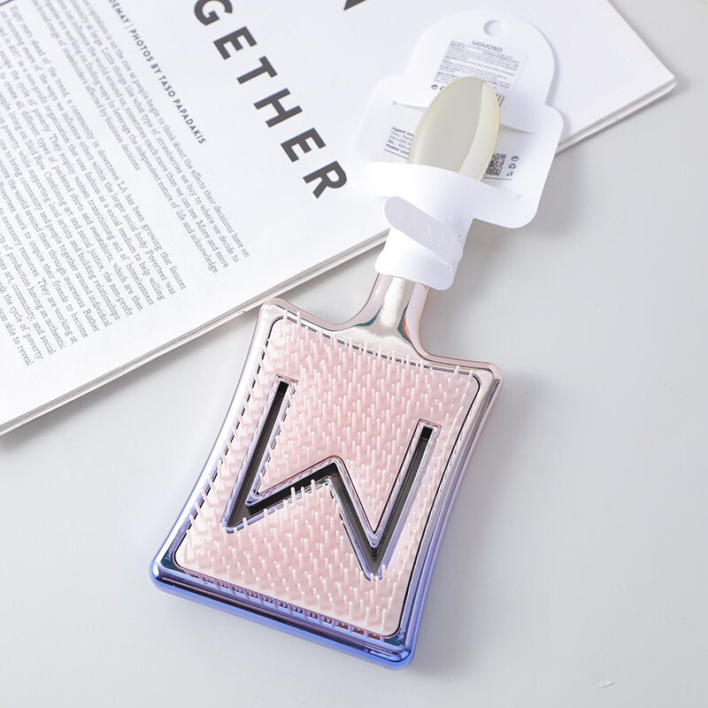 Pettine di massaggi con lettera M galvanica