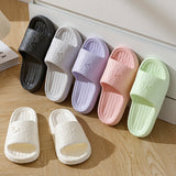 Pantofole domestiche da donna con motivo a cartoni animati di colore viola, misura 40-41