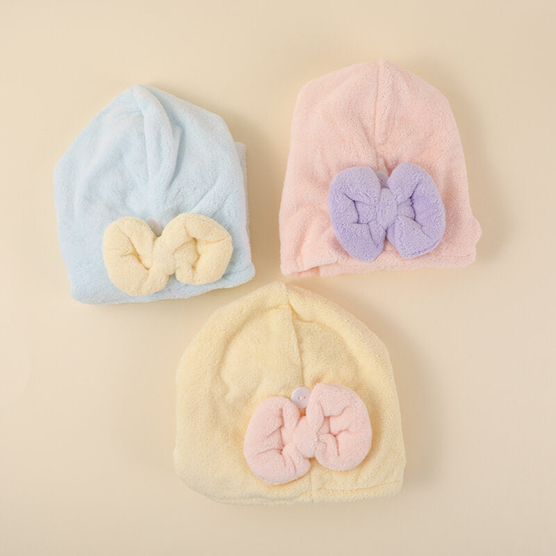 Elegante cuffia per asciugare i capelli con nodo a fiocco