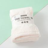 Asciugamano semplice bianco sporco