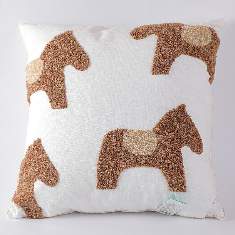 Cuscino da lancio in cavallino ricamato con semplicità nordica