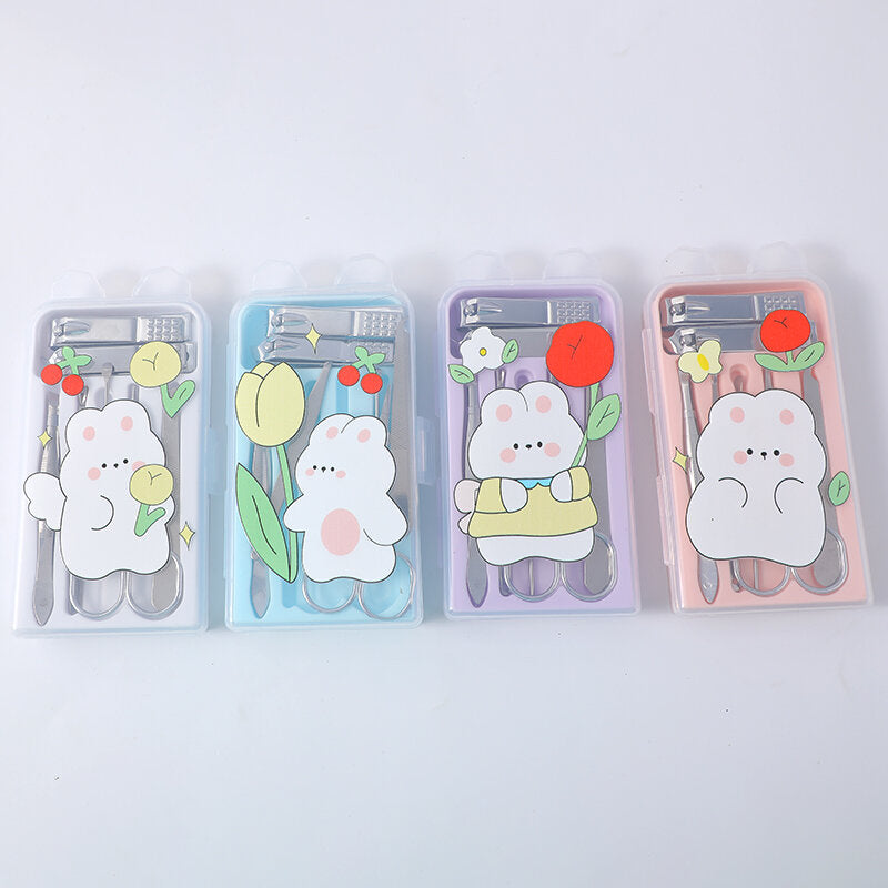 Set di sette pezzi di manicure con coniglio e testa d'orso