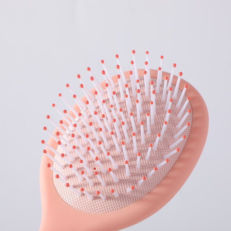 Pettine da massaggio ovale a colori con artiglio per la pulizia - arancione