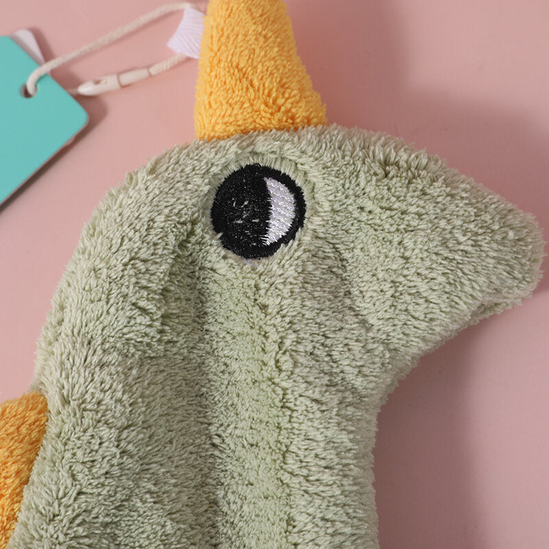 Asciugamano verde con dinosauro