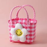 Cestino di fiori con faccina sorridente