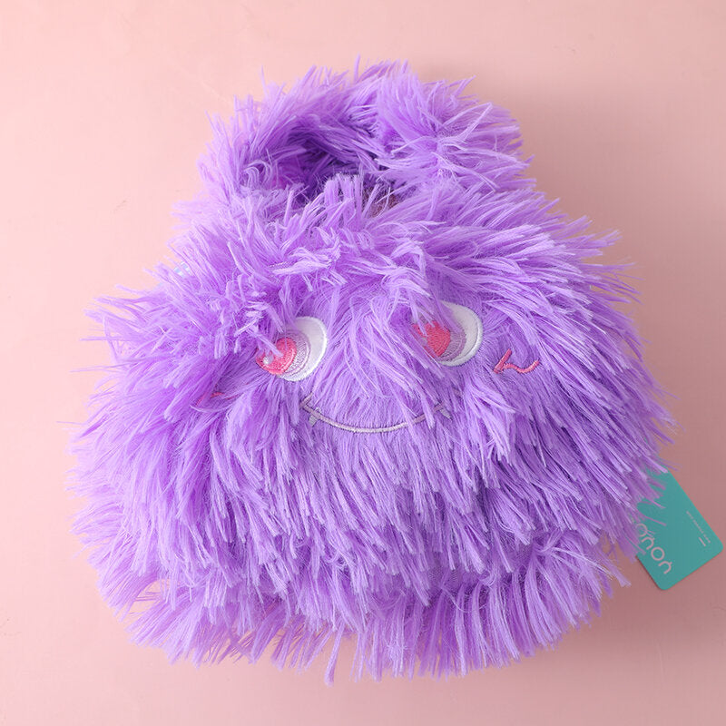 Borsa a tracolla in peluche di un simpatico mostro