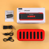 Altoparlante wireless con antenna, pannello solare e torcia elettrica, rosso