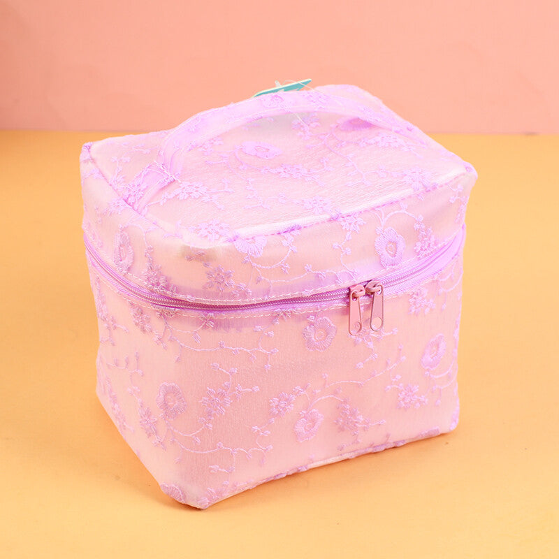 Borsa per il trucco a forma di secchiello con fiori di ciliegio viola