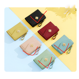 Portamonete da donna con fibbia a fiore in lega