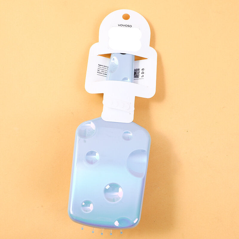 Pettine massaggiante a cuscino d'aria colorato