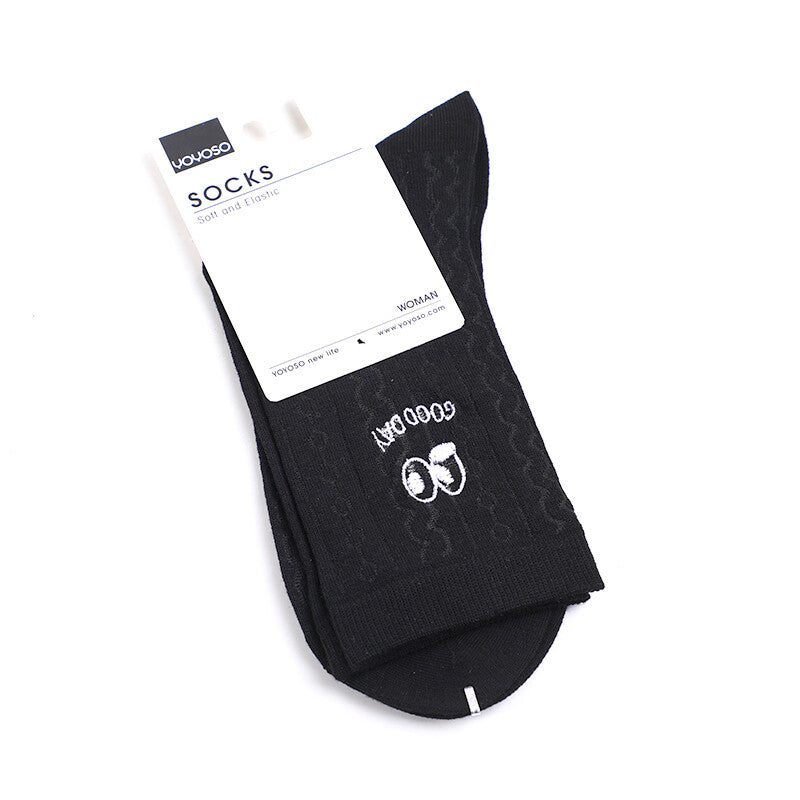 Calzini da donna a metà polpaccio con grandi occhi ricamati in bianco e nero