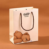 Borsa regalo con orsetto sdraiato della serie TEDDY ISLAND-M