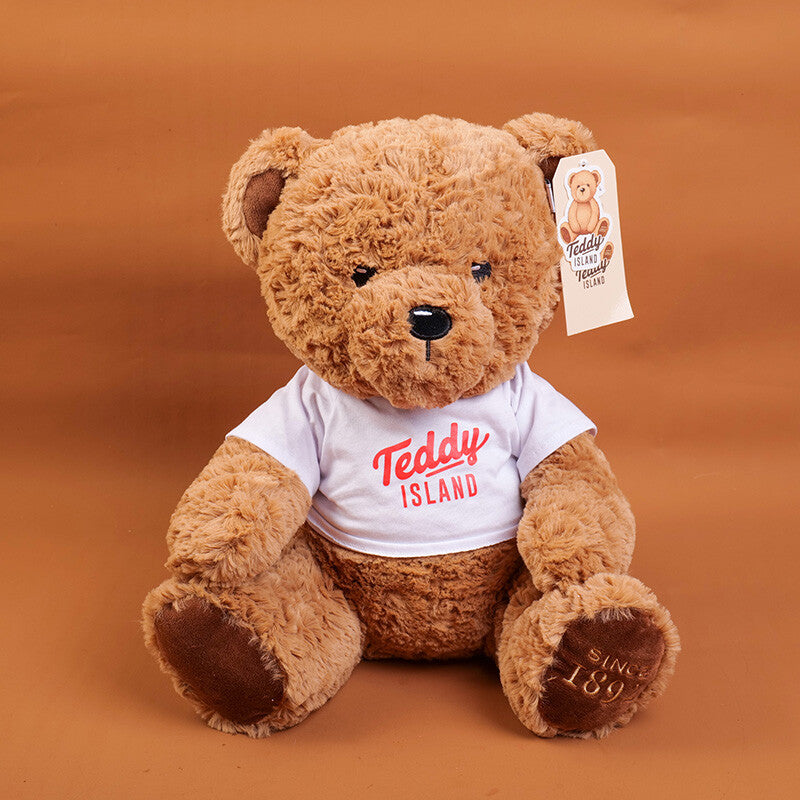 TEDDY ISLAND bambola di peluche orsetto seduto di colore scuro con maglietta arancione-35 cm
