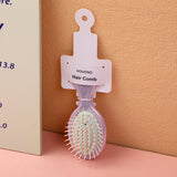 Pettine airbag colorato e portatile rosa