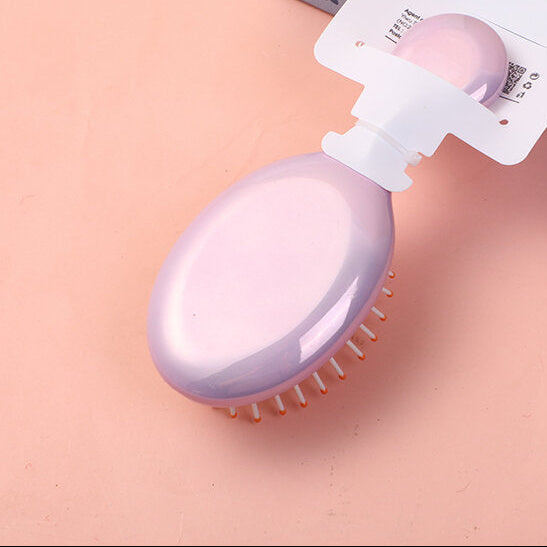 Pettine airbag colorato e portatile rosa