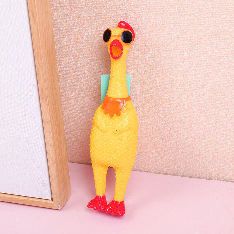 Piccolo giocattolo urlante con gli occhiali