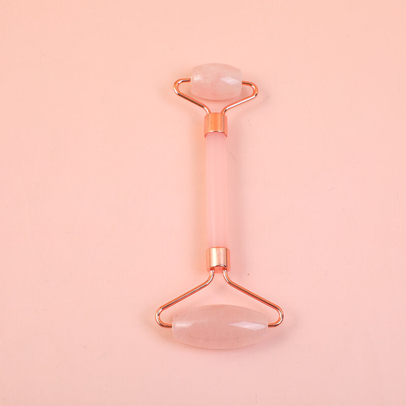 Massaggiatore a rulli in cristallo rosa con asta in acrilico