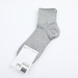 Calzini da uomo in cotone a metà polpaccio con semplici strisce verticali