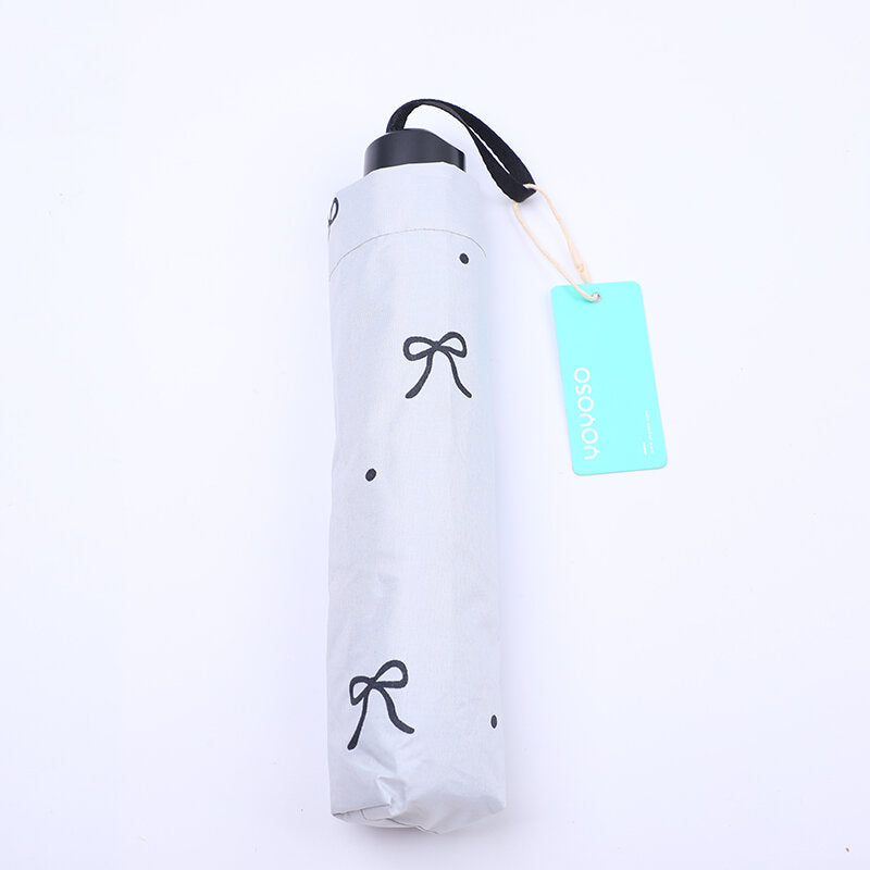 Ombrello pieghevole a tre ante con fiocco in pizzo